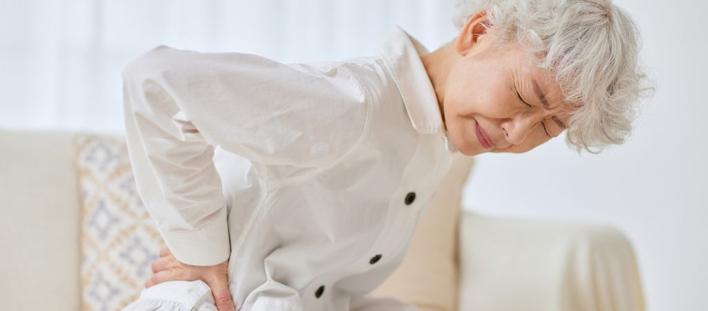 woman experiencing chronic pain and discomfort