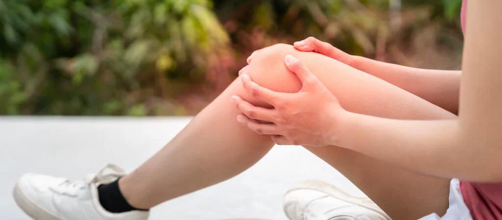 Person with fatigue and joint pain from inflammation