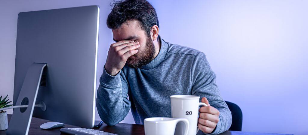 Person experiencing chronic fatigue and low energy