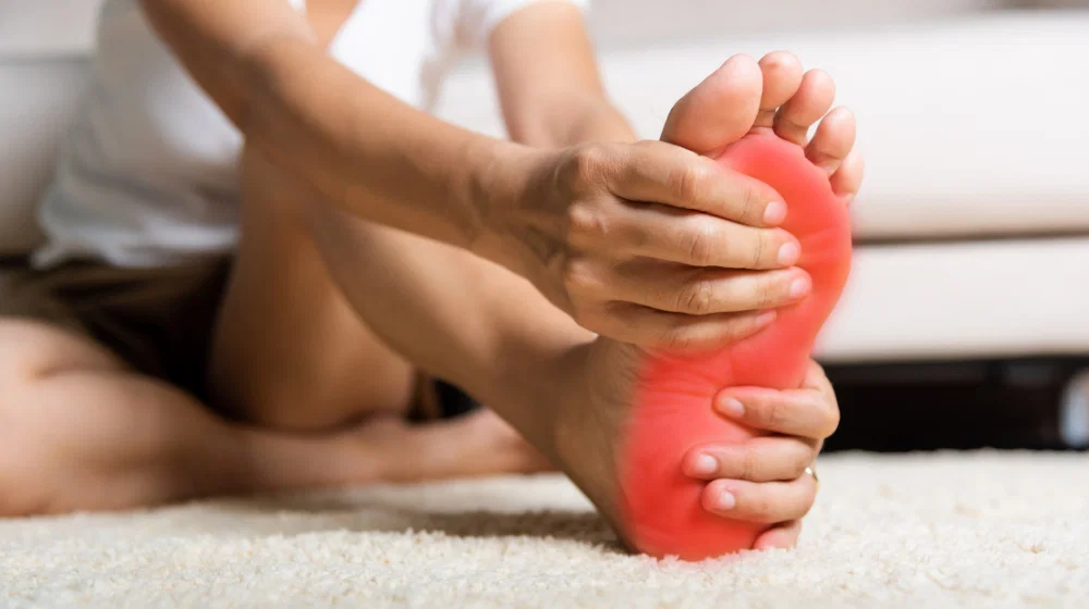 Burning feet at night with nerve pain and a medical illustration of foot nerves.